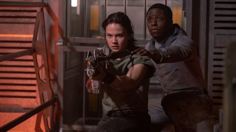 Scene from Alien: Romulus showing young characters facing danger, symbolizing leadership lessons under pressure